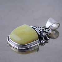 Sterling silver designer pendant with silver butterfly and amber.Silver 950